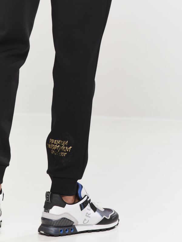 מכנסי טרנינג עם הדפס לגברים