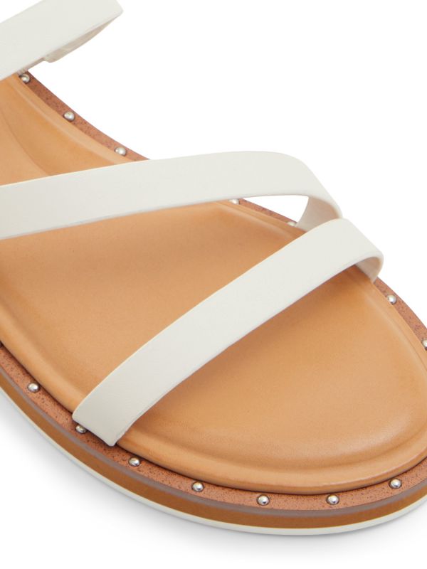 NYDALINWAN - סנדלים שטוחים עם רצועות ניטים מוצלבות לנשים