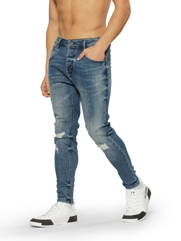 מכנסי ג’ינס COLIN כחול משופשף עם קרעים לגברים