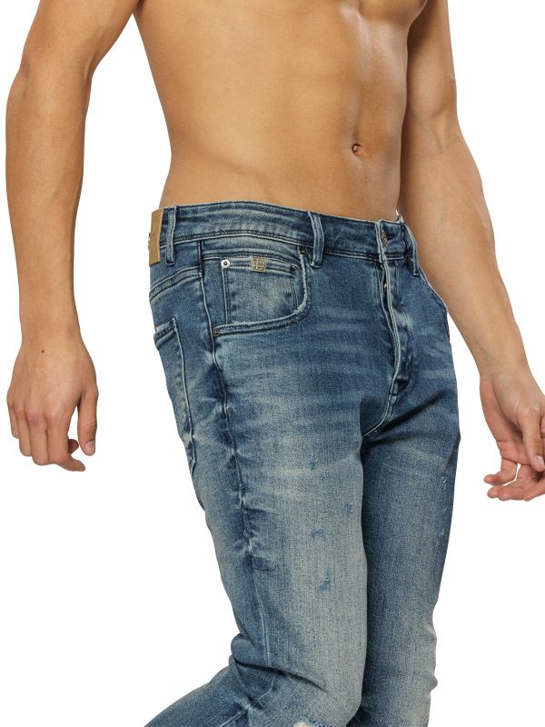 מכנסי ג’ינס COLIN כחול משופשף עם קרעים לגברים