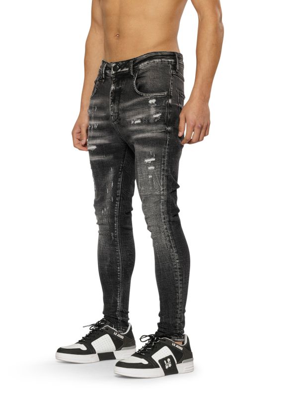 מכנסי ג’ינס COLIN סקיני בצבע שחור עם קרעים לגברים