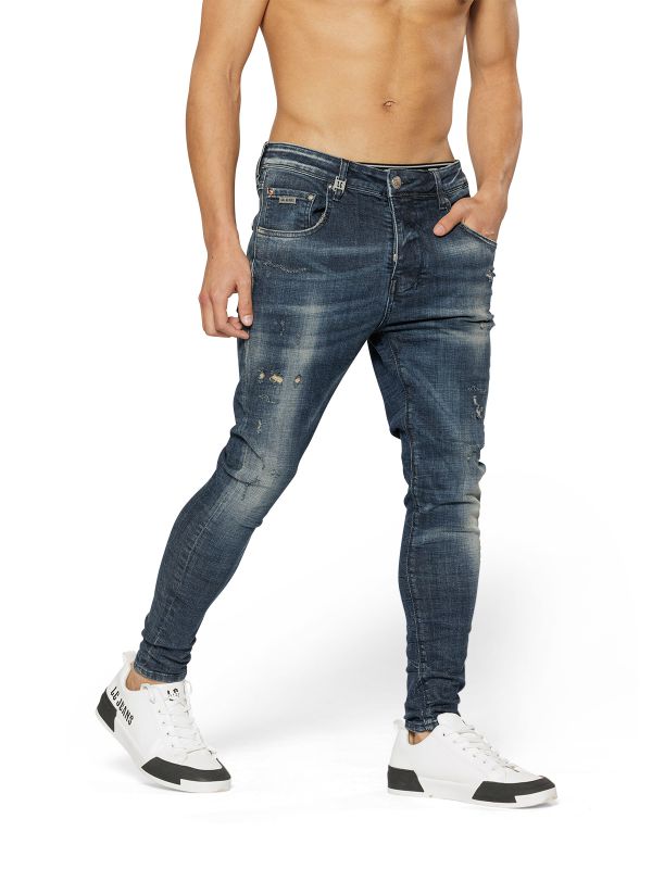 מכנסי ג’ינס COLIN כחול משופשף עם קרעים לגברים