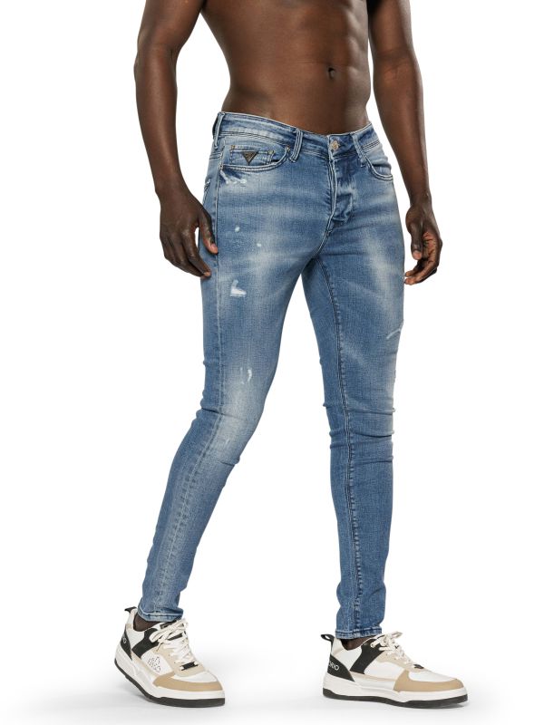 מכנסי ג’ינס סקיני בצבע כחול בהיר משופשף עם קרעים לגברים