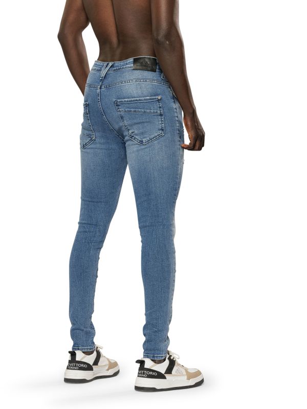 מכנסי ג’ינס סקיני בצבע כחול בהיר משופשף עם קרעים לגברים