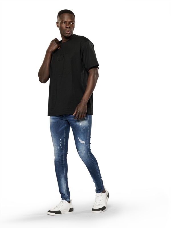 מכנסי ג’ינס סקיני בצבע כחול משופשף עם קרעים לגברים