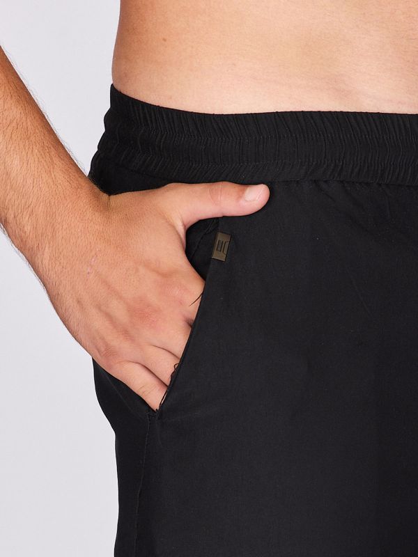 מכנסיים שחורים בגזרה רחבה לגברים